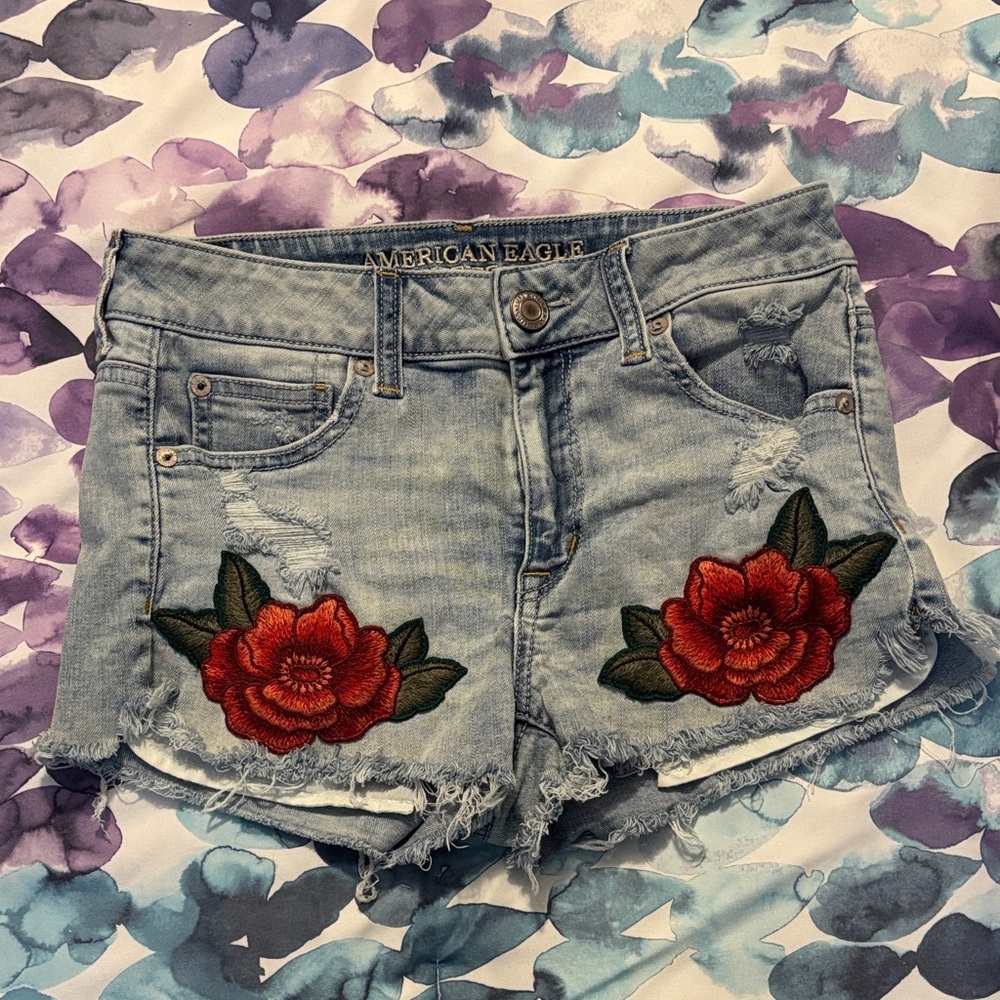 American Eagle Outfitters Light Blue Jean Shorts with Red flower patches